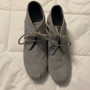 Woman’s gray boots